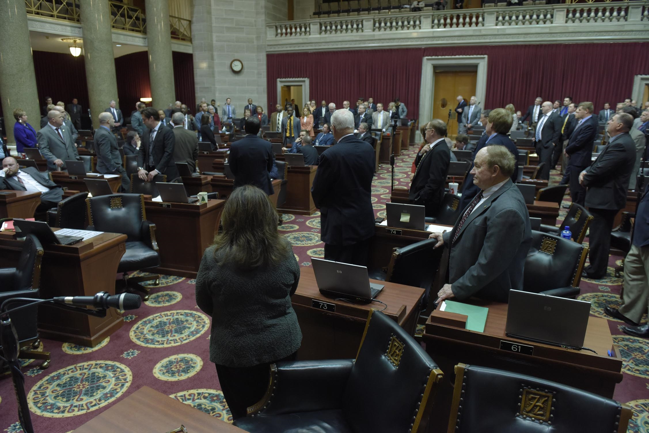 Missouri House members listen quietly as Representative Bruce Franks (yellow shirt near center) asks them to support increased education about youth violence, in a bill named for his brother, who was shot to death at the age of 9.  (photo; Tim Bommel, Missouri House Communications)